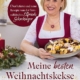 Cover of a German cookbook titled 'Meine besten Weihnachtskekse' featuring a smiling woman in a dirndl presenting a plate of cookies.
