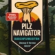 Book cover for 'Pilz Navigator' showing a large mushroom over a forest scene, authors Vanessa & Norman Glatzer; SPIEGEL bestseller badge and Ulmer logo present.